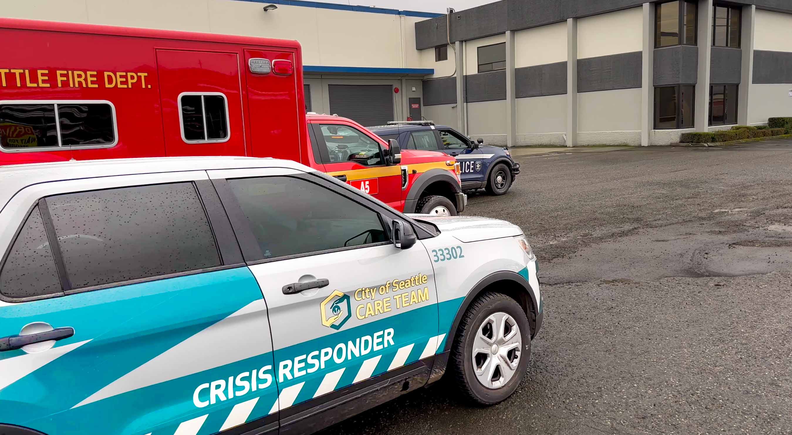 Three responder vehicles, including CARE, SFD and SPD responders lined up one after the other.