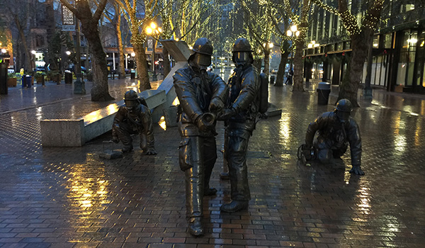 Bronze statues at the Fallen Firefighter Memorial in Occidental Park