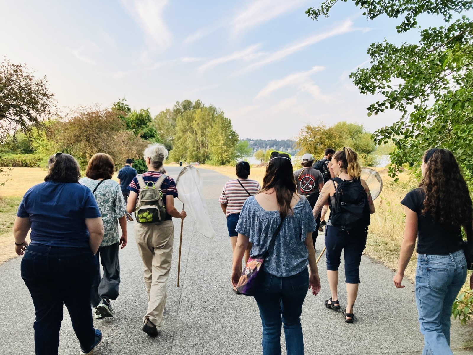 A group of adults walking through Discovery Park