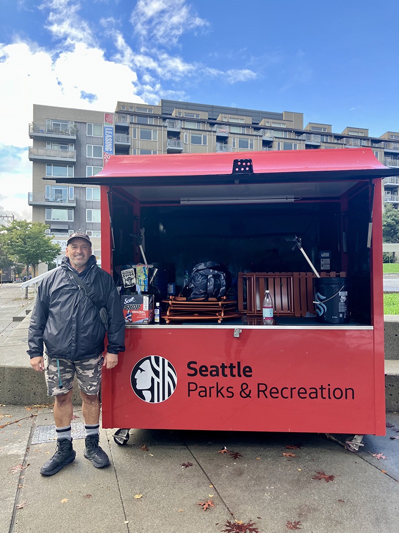 Park Concierge Kelly stands at Cal Anderson Park