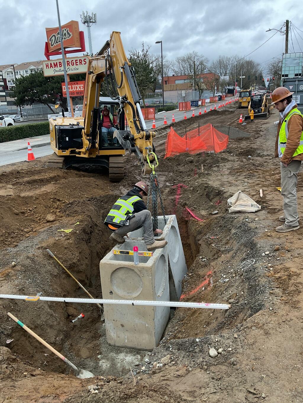 Crews installed catch basins for the new storm drain system.