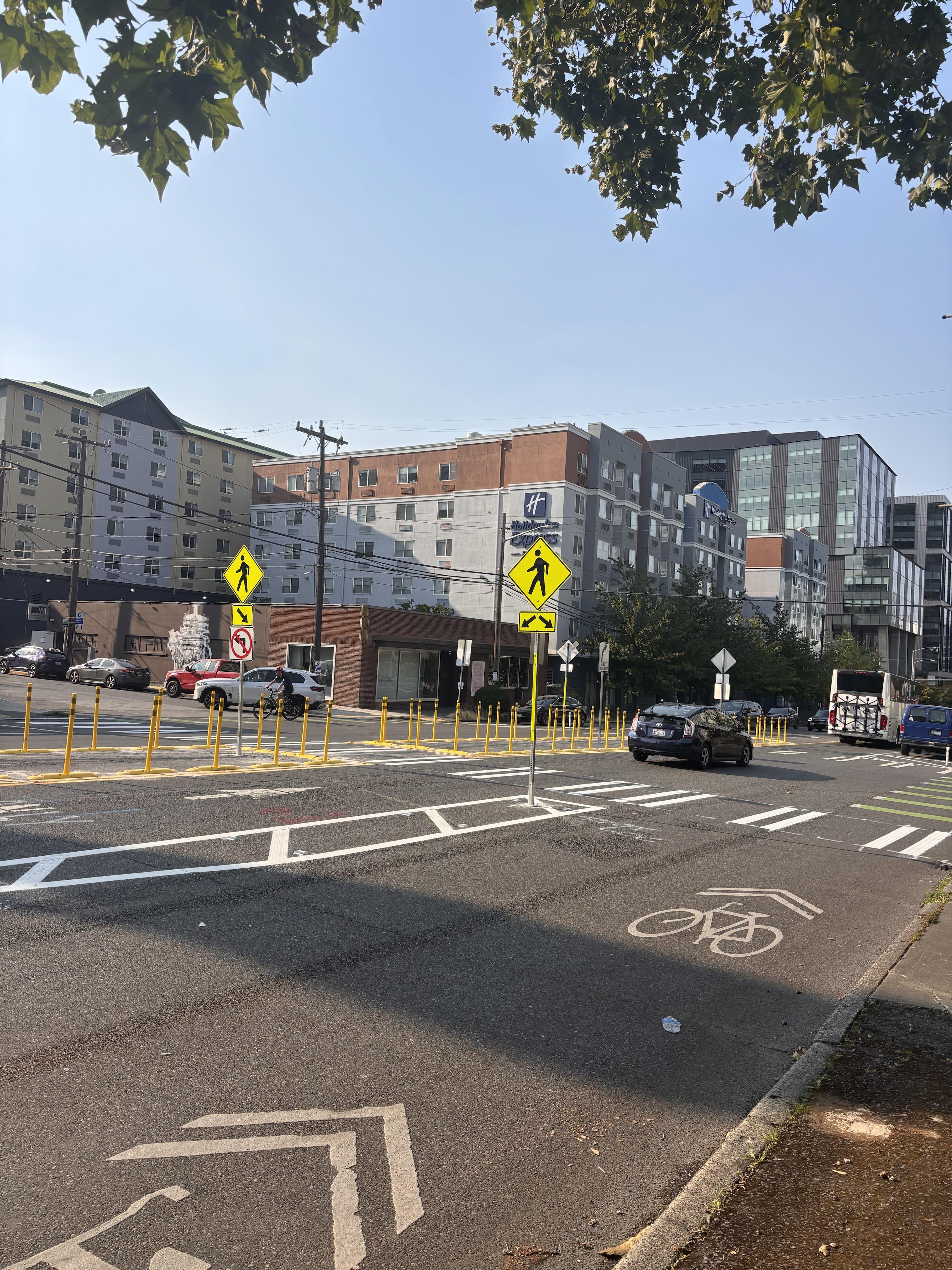 Northbound view of new paint and post center median on Dexter Ave N at John St.
