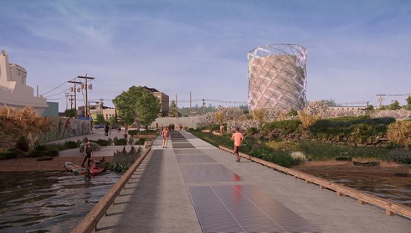 Landscaped shore line access with pump station in the background.
