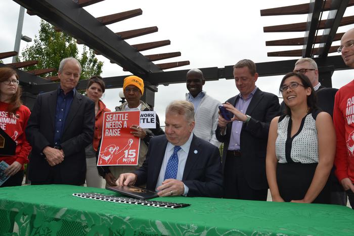 Mayor Ed Murray signs minimum wage bill