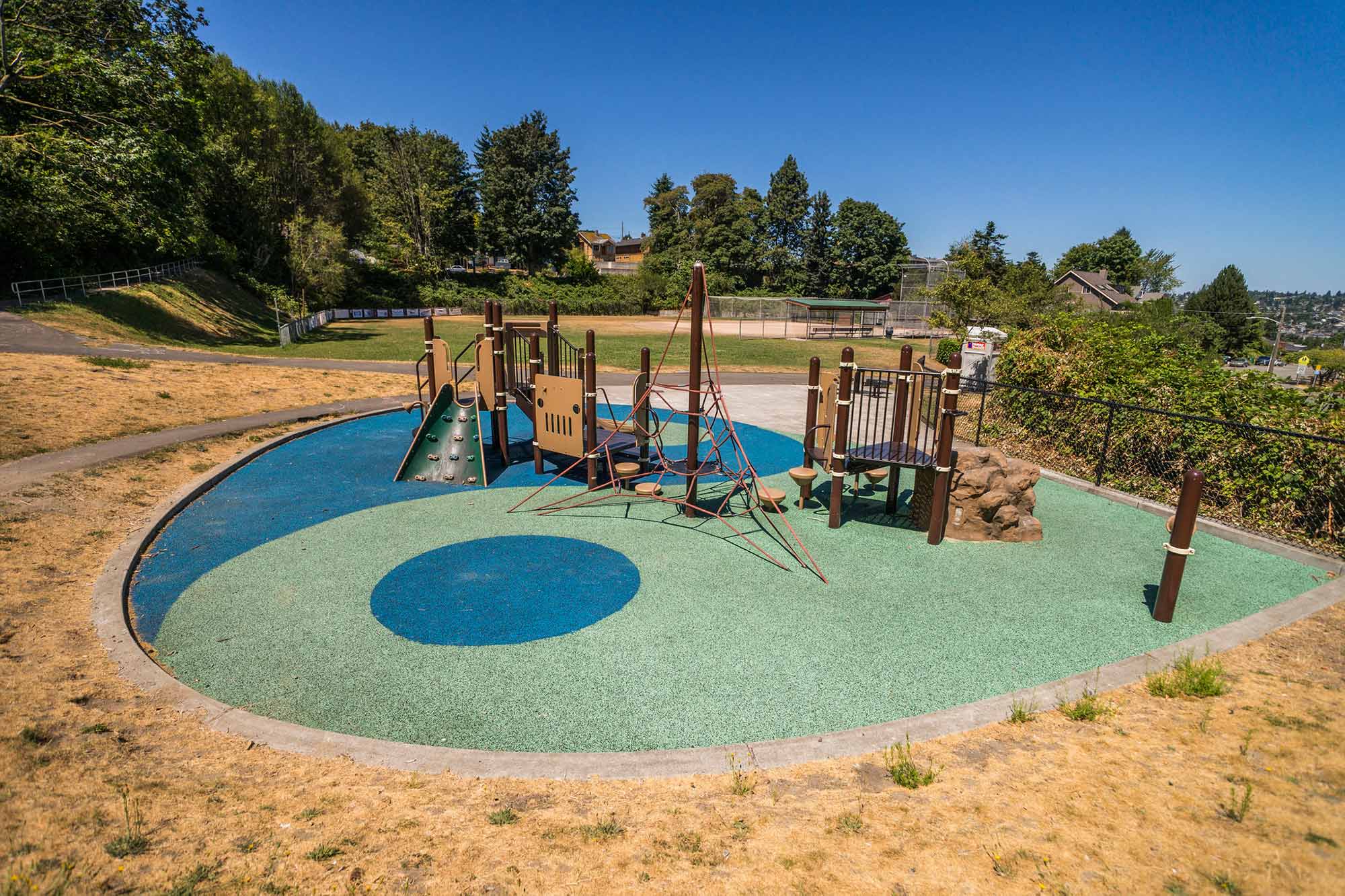Lawton Park ying yang play area art - Photo by TIA International Photography