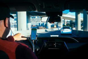 A passenger's view from the back seat of a ride share vehicle