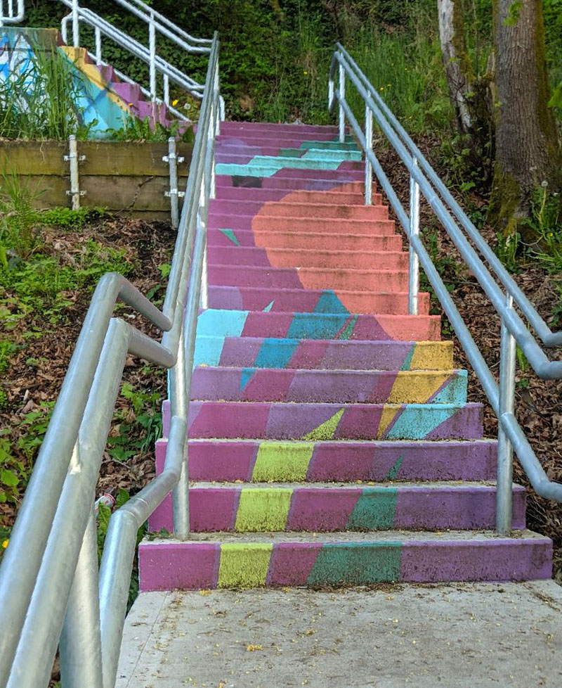 A brightly painted stairway at 12th Ave S and S Trenton