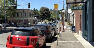 Cars parked along the street in Columbia City