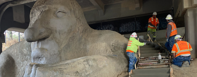 SDOT employees fixing the stairwell by the troll