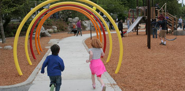 Stock Image of Kids playing at Maple Leaf Park