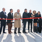Group cutting the ribbon at the official opening of Overlook Walk 