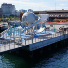 Aquatic inspired play area looking toward downtown with the Miner’s Landing building in the background.  