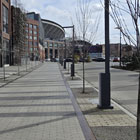 Concrete pavers, metal inlays, and trees replaced the original railroad lines on the South Plaza